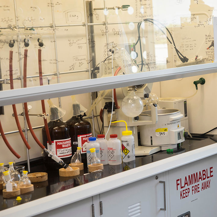 A student chemistry lab with lots of equipment and solvents